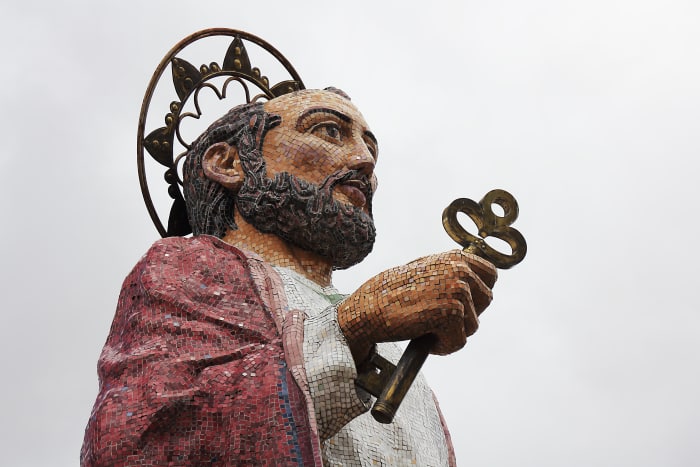 Detail of the San Pedro statue head, with mosaic tile texture