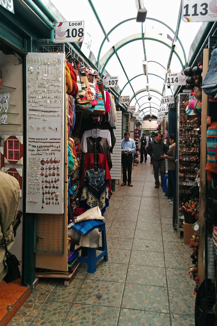 Interior market with numbered vendor stalls