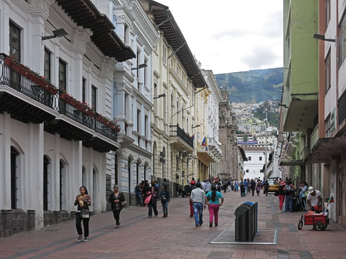 People walking on pedestrian path in Quito, Ecuador