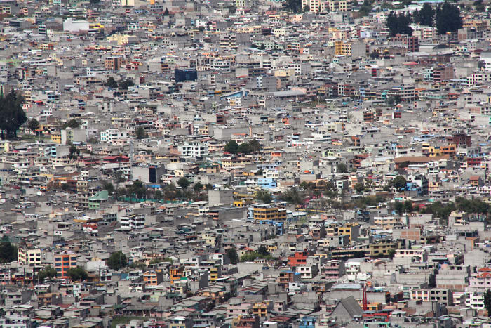 Maze of dense concrete buildings in Quito, Ecuador