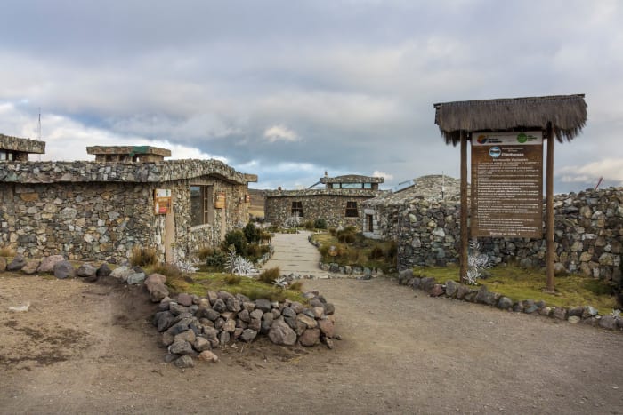 Rubble wall buildings welcoming you to Mount Chimborazo